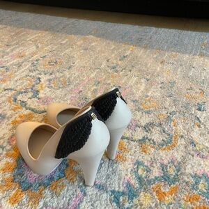 Melissa Vivienne Westwood Cream Heels with Black Glitter Wing Accent